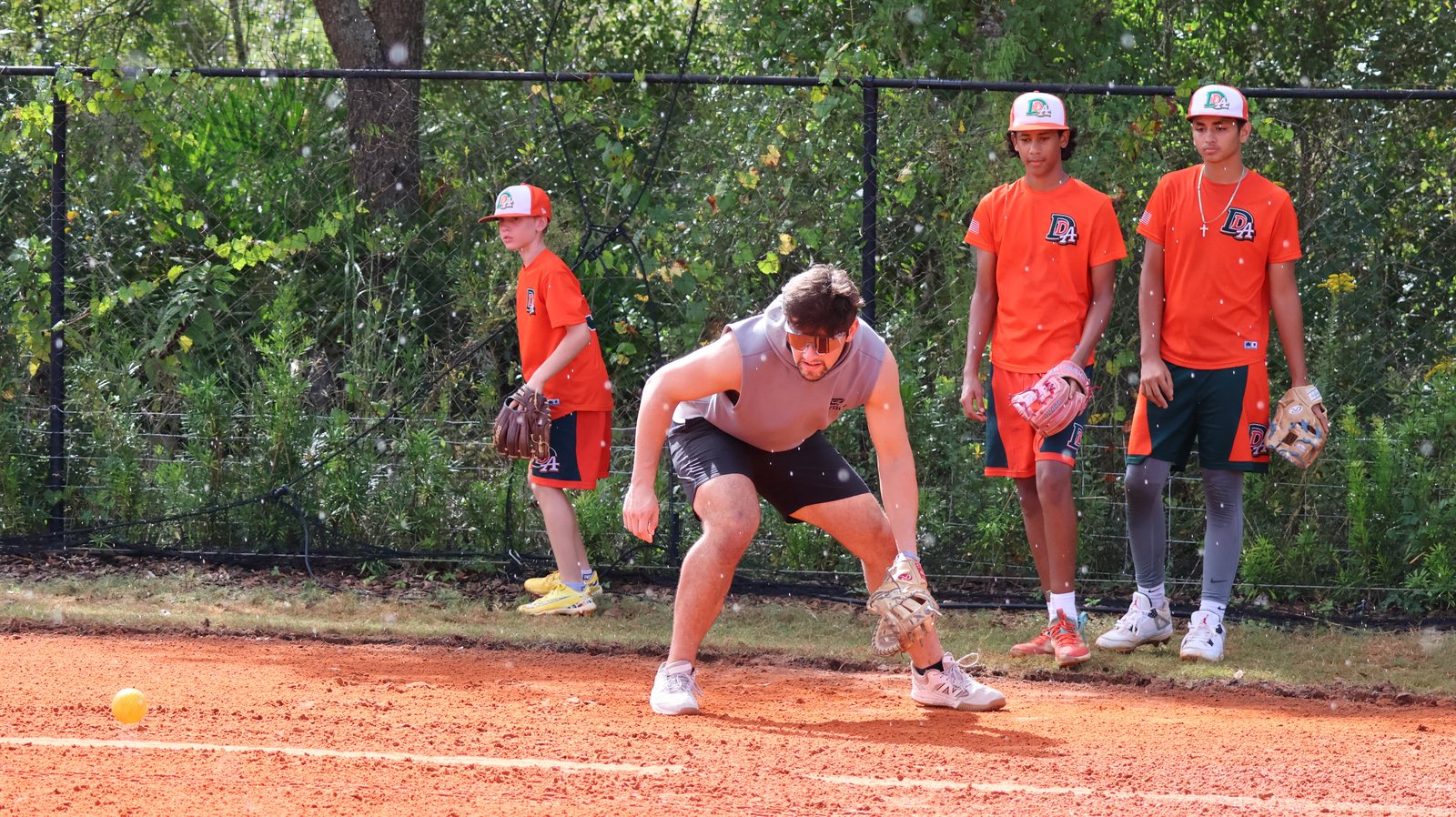 Jaime Ferrer fielding with DDLA athletes