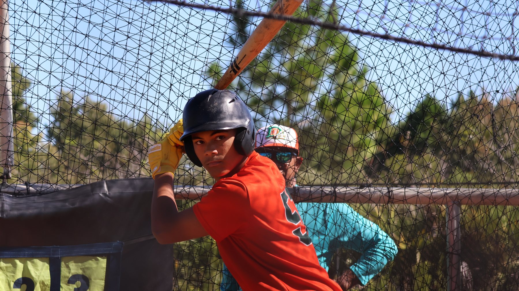 Jake Espinal hitting in the DDLA cage