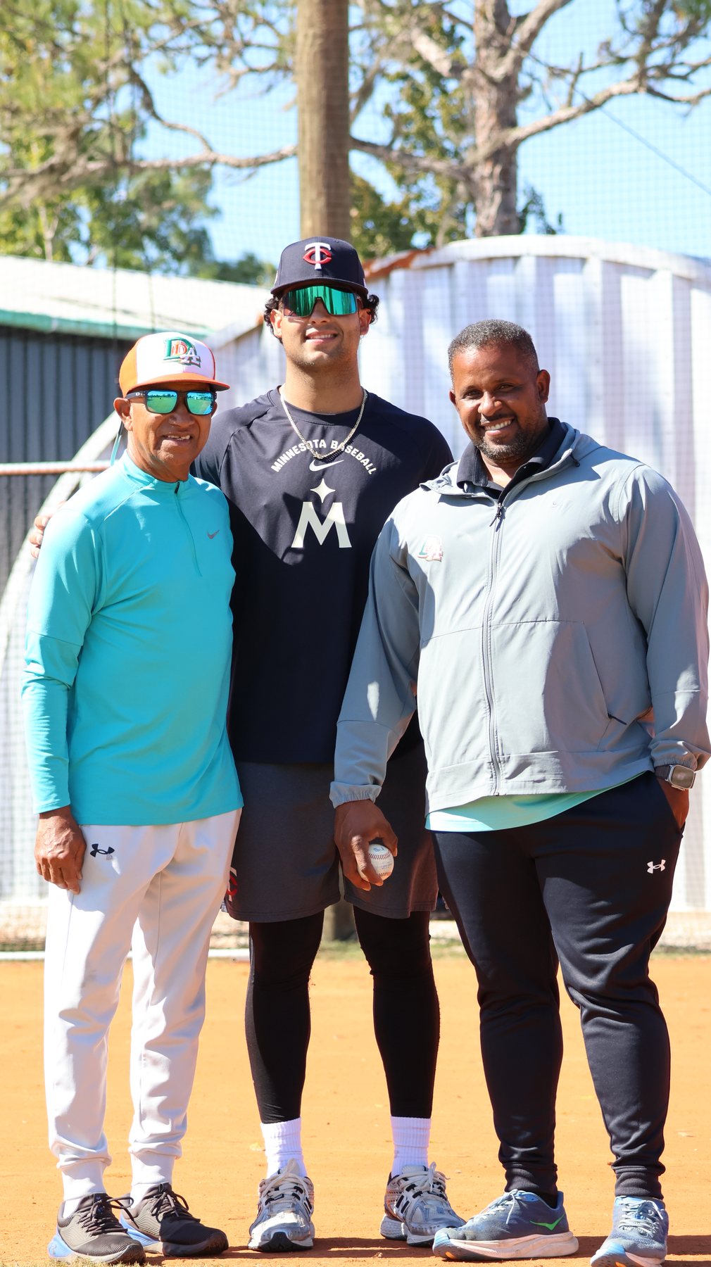 Coach Roberto Santana with Charlee Soto and Coach Luis Arzeno