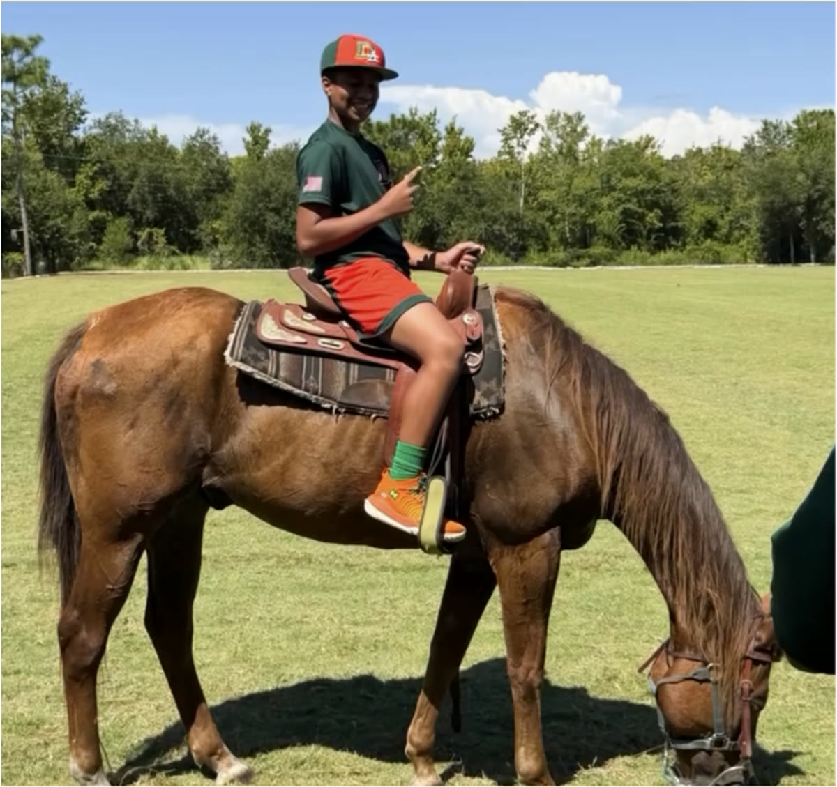 DDLA athlete in uniform on horseback